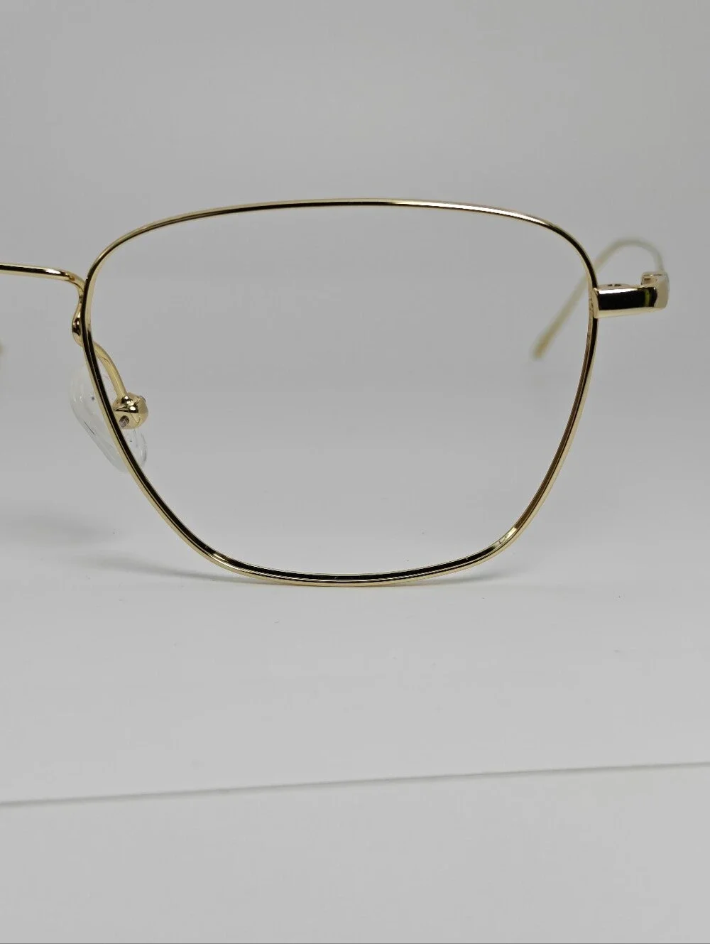 Future. Titanium Eyeglass Temple Arm in Gold. Minimalist Nose Pads.